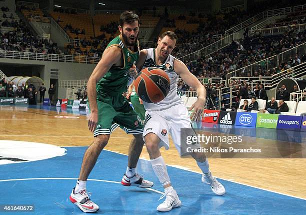 Darius Songaila, #9 of Zalgiris Kaunas competes with Antonis Fotsis, #9 of Panathinaikos Athens during the Euroleague Basketball Top 16 Date 3 game...
