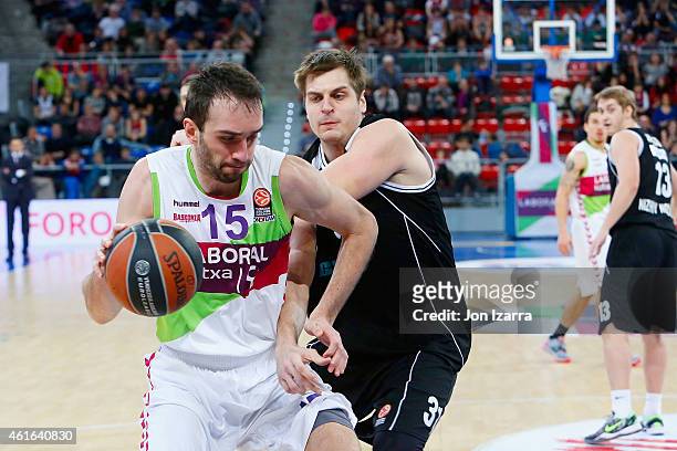 Mirza Begic, #15 of Laboral Kutxa Vitoria competes with Maksim Krivosheev, #31 of Nizhny Novgorod in action during the Euroleague Basketball Top 16...