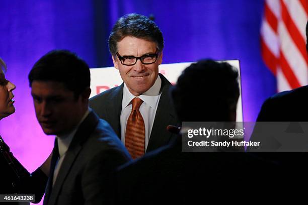 Texas Governor Rick Perry speaks to fellow Republicans during a luncheon meeting during the Republican National Committee's Annual Winter Meeting on...
