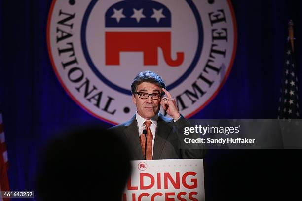 Texas Governor Rick Perry speaks to fellow Republicans during a luncheon meeting during the Republican National Committee's Annual Winter Meeting on...
