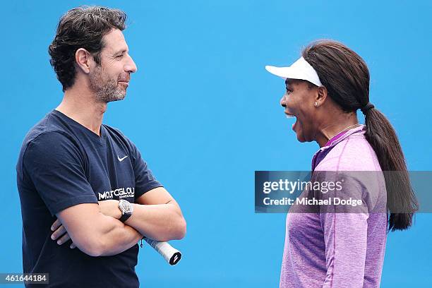 Serena Williams of the USA reacts with her coach Patrick Mouratoglou during a practice session ahead of the 2015 Australian Open at Melbourne Park on...