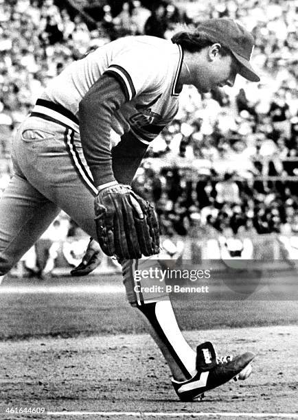 Pitcher Dave LaPoint of the St. Louis Cardinals commits an error during the 7th inning during Game 4 of the 1982 World Series against the Milwaukee...