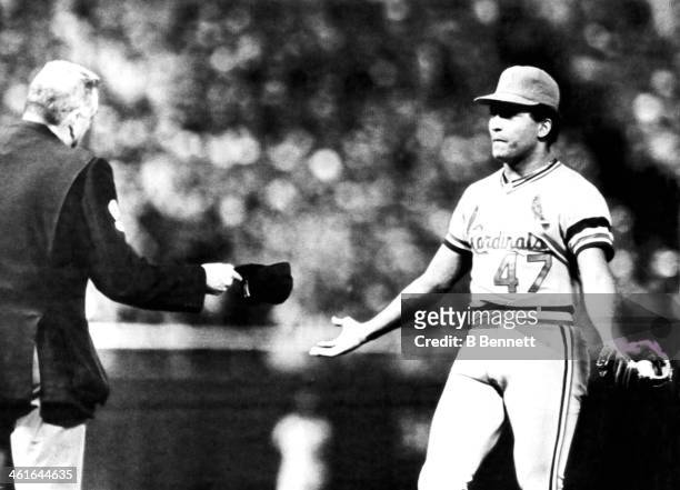 Pitcher Joaquin Andujar of the St. Louis Cardinals is warned by home plate umpire John Kibler after arguing "ball and strikes" during Game 3 of the...