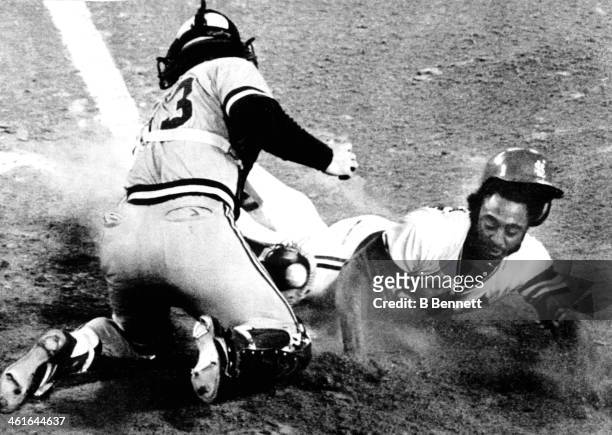 Lonnie Smith of the St. Louis Cardinals is tagged out by catcher Ted Simmons of the Milwaukee Brewers after trying to steal home during Game 6 of the...