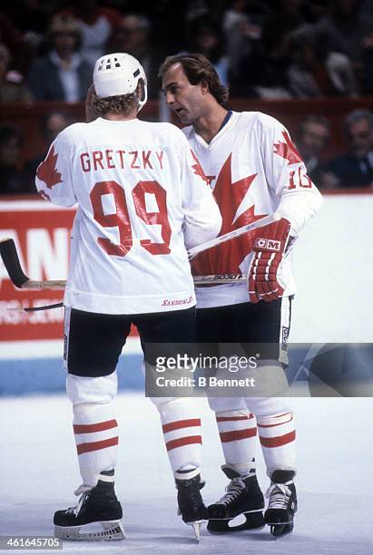 Guy Lafleur of Canada talks with Wayne Gretzky during the 1981 Canada Cup Final against the Soviet Union on September 13, 1981 at the Montreal Forum...