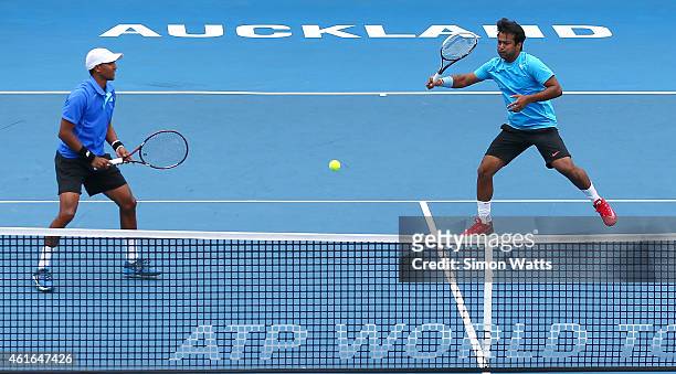 Leander Paes of India and Raven Klassen of South Africa play a shot during their doubles final match against Dominic Inglot of Great Britain and...