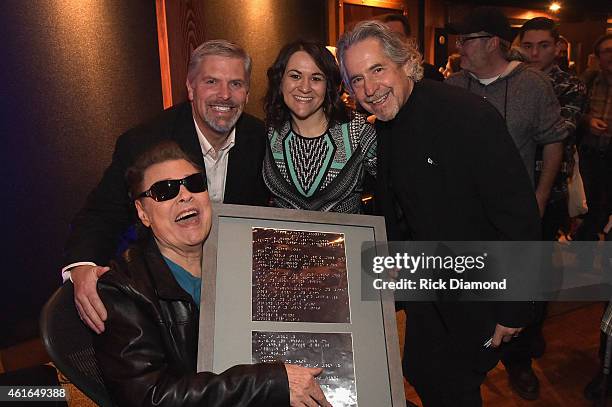 Ronnie Milsap, Black River Entertainment's Gordon Kerr, Dawn Delvo, and Burt Stein celebrate at Ronnie's Place, Black River Entertainment on January...