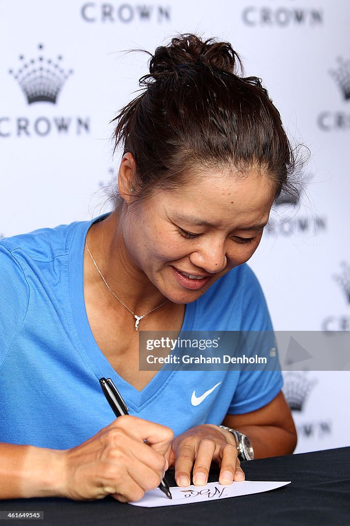 Little Li Na Li Na of China signs her autograph for fans at the Tennis Livesite at ...