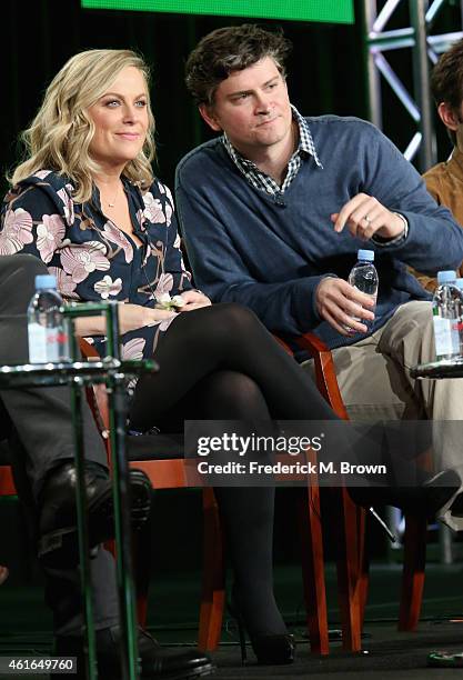 Actress Amy Poehler and executive prodcuer Mike Schur speak onstage during the 'Parks and Recreation' panel discussion at the NBC/Universal portion...