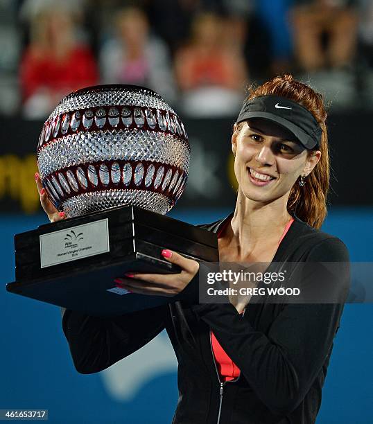 Tsvetana Pironkova of Bulgaria holds the winners trophy after defeating Angelique Kerber of Germany in the women's singles final at the APIA Sydney...