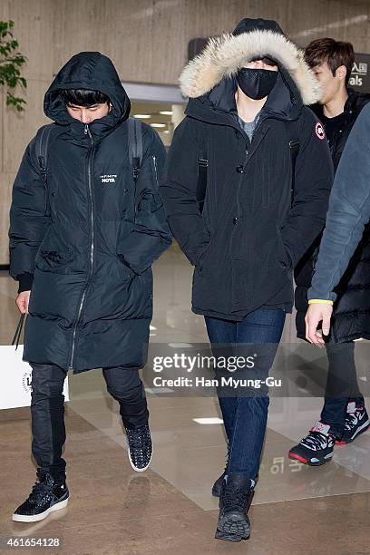 Hoya and Sung Yeol of South Korean boy band Infinite are seen upon arrival at Gimpo International Airport on January 16, 2015 in Seoul, South Korea.