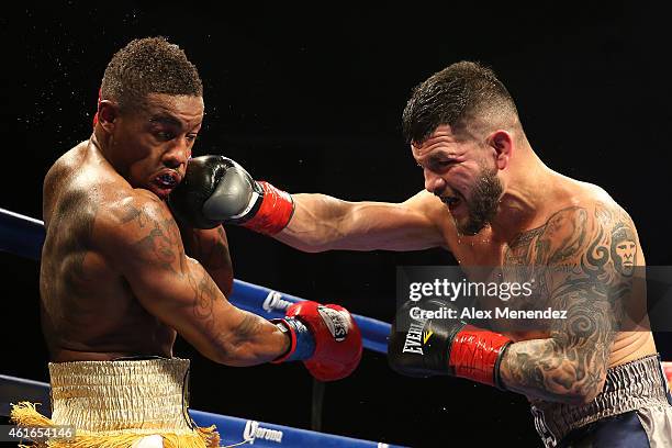 Bryan Vera punches Willie Monroe Jr. During their NABA/NABO middleweight championship fight at the Turning Stone Resort Casino on January 16, 2015 in...