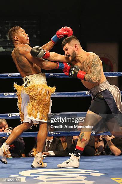 Bryan Vera punches Willie Monroe Jr. During their NABA/NABO middleweight championship fight at the Turning Stone Resort Casino on January 16, 2015 in...