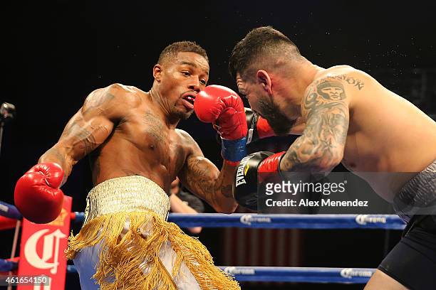 Bryan Vera punches Willie Monroe Jr. During their NABA/NABO middleweight championship fight at the Turning Stone Resort Casino on January 16, 2015 in...