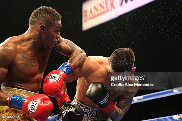 Willie Monroe Jr. Punches Bryan Vera during their NABA/NABO middleweight championship fight at the Turning Stone Resort Casino on January 16, 2015 in...
