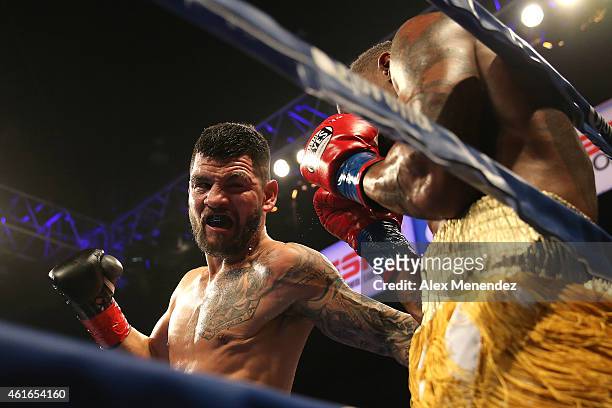Bryan Vera punches Willie Monroe Jr. During their NABA/NABO middleweight championship fight at the Turning Stone Resort Casino on January 16, 2015 in...