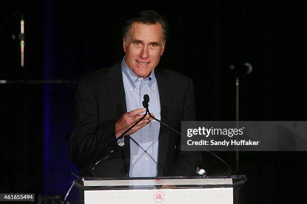 Mitt Romney speaks to fellow Republicans at a dinner during the Republican National Committee's Annual Winter Meeting aboard the USS Midway on...