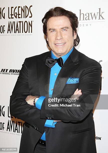 John Travolta arrives at the 12th Annual "Living Legends of Aviation" Awards held at The Beverly Hilton Hotel on January 16, 2015 in Beverly Hills,...