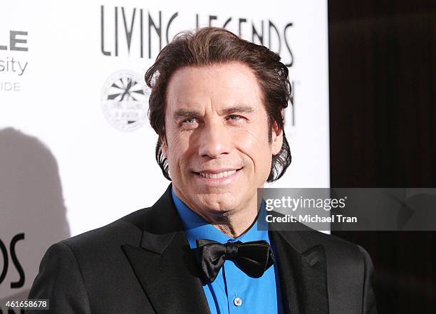 John Travolta arrives at the 12th Annual "Living Legends of Aviation" Awards held at The Beverly Hilton Hotel on January 16, 2015 in Beverly Hills,...