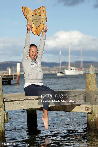 Heather Watson of Great Britain poses with the winners trophy at Battery Point during day seven of the Hobart International at Domain Tennis Centre...