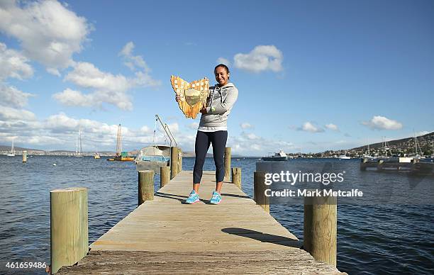 Heather Watson of Great Britain poses with the winners trophy at Battery Point during day seven of the Hobart International at Domain Tennis Centre...