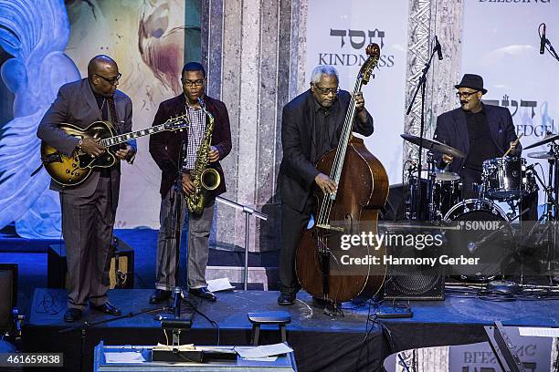 Jacques Lesure and Cecil Brooks III attend Shabbat Service Honoring Paris Terrorist Victims And The Legacy Of Dr. Martin Luther King, Jr. At Saban...