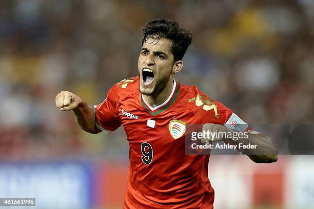 Abdul Aziz Al-Maqbali of Oman celebrates a goal during the 2015 Asian Cup match between Oman and Kuwait at Hunter Stadium on January 17, 2015 in...