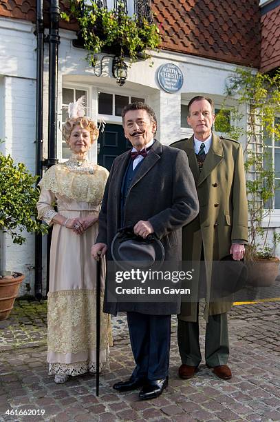 Liza Goddard, Robert Powell and Robin McCallum attend a photocall for the theatre production of Agatha Christie's "Black Coffee" at the writer's...
