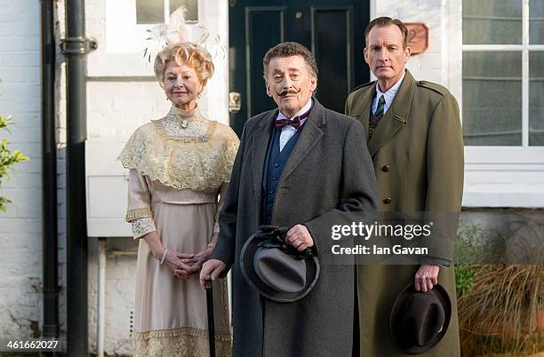 Liza Goddard, Robert Powell and Robin McCallum attend a photocall for the theatre production of Agatha Christie's "Black Coffee" at the writer's...