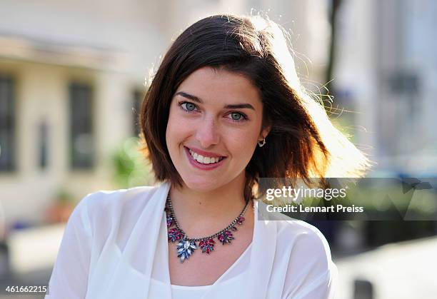 Model Marie Nasemann poses prior to a hair dressing session where she gets hair extensions on January 10, 2014 in Munich, Germany.