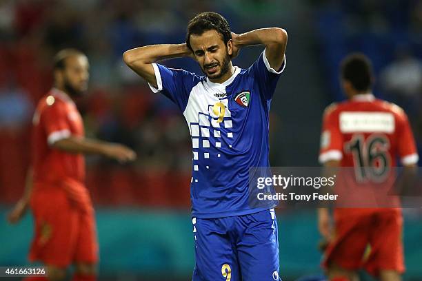 Abdullah Al Buraiki of Kuwait looks dejected after losing to Oman during the 2015 Asian Cup match between Oman and Kuwait at Hunter Stadium on...