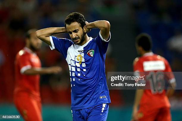 Abdullah Al Buraiki of Kuwait looks dejected after losing to Oman during the 2015 Asian Cup match between Oman and Kuwait at Hunter Stadium on...