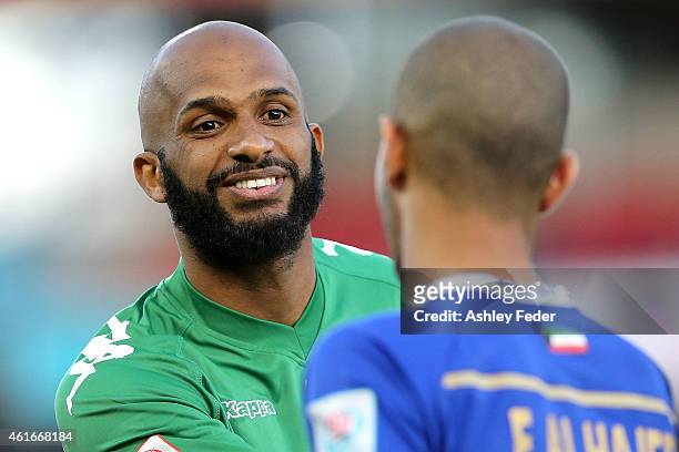 Ali Al Habsi goalkeeper of Oman shakes hands with Kuwait players before the 2015 Asian Cup match between Oman and Kuwait at Hunter Stadium on January...
