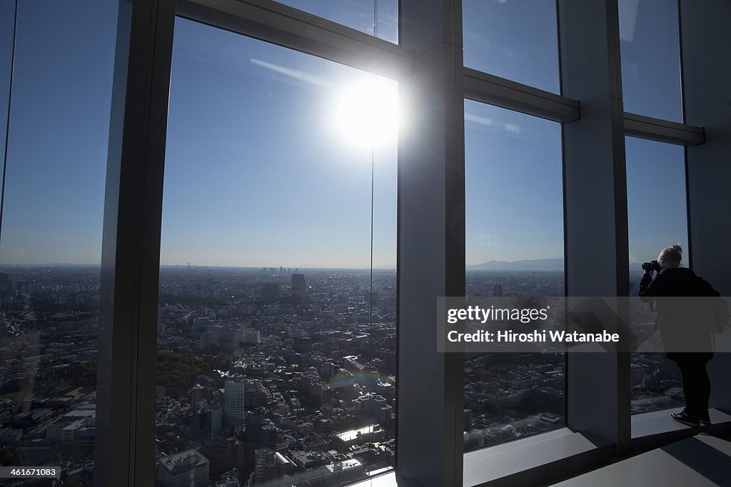 Woman taking photo from the observation floor