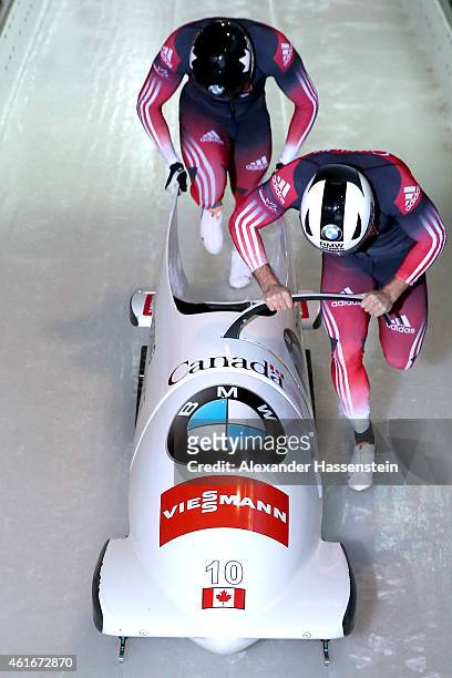 Pilot Justin Kripps and Bryan Barnett of Canada compete during the Viessmann FIBT Bob World Cup at Deutche Post Eisarena on January 17, 2015 in...