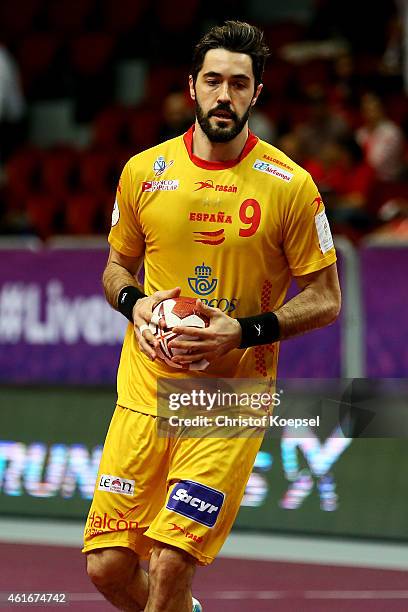 Raul Enterrios of Spain passes the ball during the IHF Men's Handball World Championship group A match between Brazil and Spain at Duhail Handball...