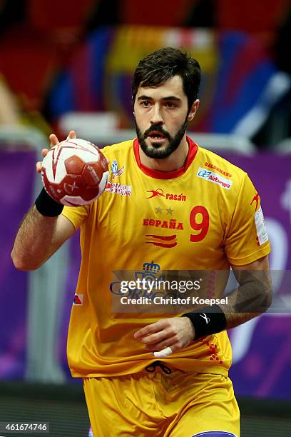 Raul Enterrios of Spain passes the ball during the IHF Men's Handball World Championship group A match between Brazil and Spain at Duhail Handball...