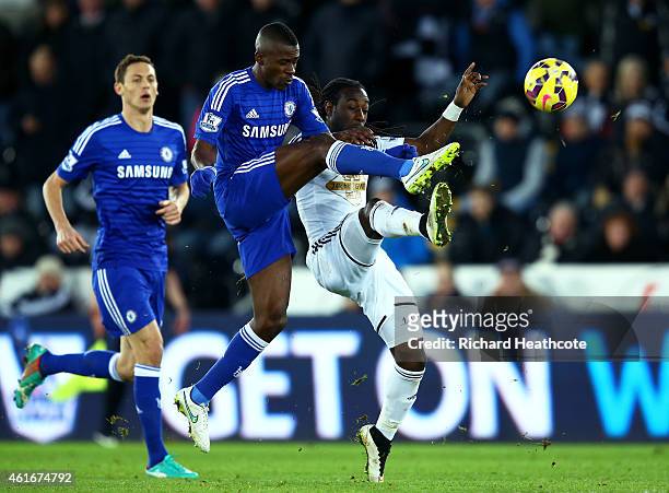 Ramires of Chelsea challenges Marvin Emnes of Swansea City for the ball during the Barclays Premier League match between Swansea City and Chelsea at...