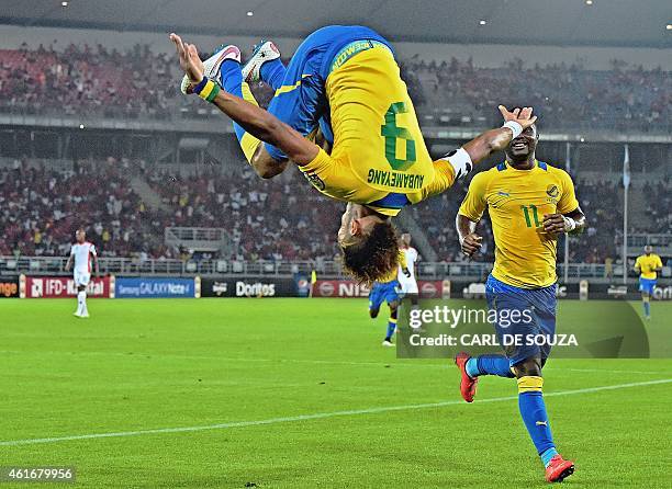 Gabon's forward Pierre-Emerick Aubameyang celebrates after scoring a goal during the 2015 African Cup of Nations group A football match between...