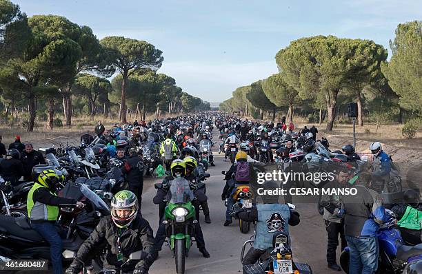 Motorcycle enthusiasts enter the camping grounds of Puente Duero in Valladolid for the 33rd edition of the "Pinguinos" on 10 January 2014. Pinguinos...