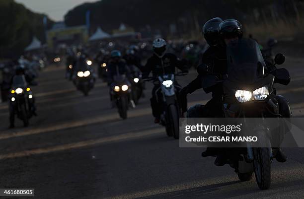 Motorcycle enthusiasts leave Puente Duero in Valladolid during the 33rd edition of the "Pinguinos" on 10 January 2014. Pinguinos is said to be the...