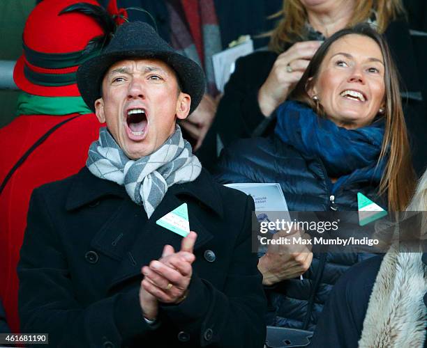 Frankie Dettori and wife Catherine Dettori cheer as they watch Dodging Bullets run to victory in the Sodexo Clarence House Steeple Chase during the...