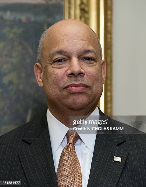New US Homeland Security Secretary Jeh Johnson attends a ceremonial swearing-in ceremony in the Roosevelt Room at the White House in Washington,DC on...