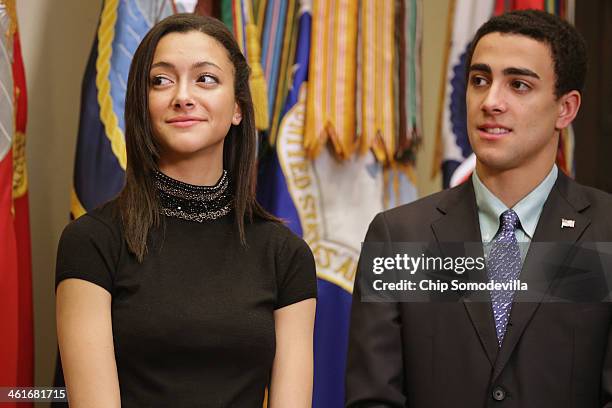 Natalie Johnson and Jeh Charles Johnson, Jr., children of Homeland Security Secretary Jeh Johnson, participatesin his ceremonial swearing in to...