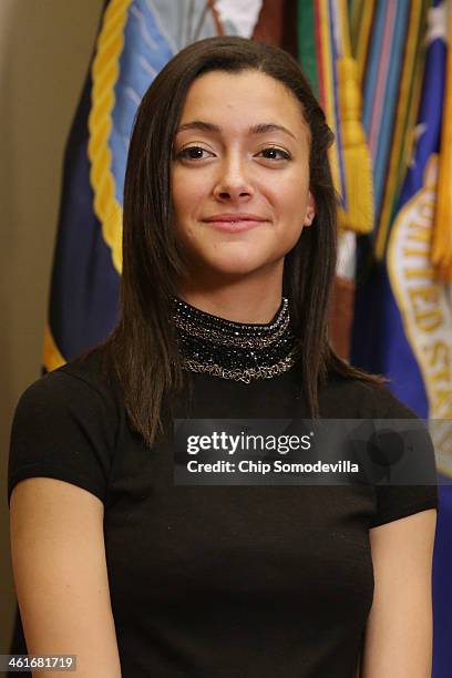 Natalie Johnson, daughter of Homeland Security Secretary Jeh Johnson participates in his ceremonial swearing in to office in the Roosevelt Room at...