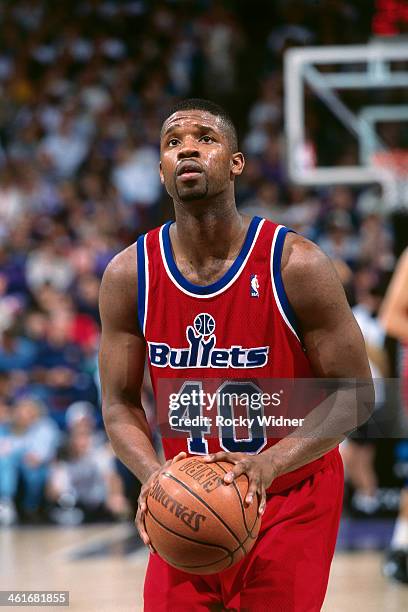 Calbert Cheaney of the Washington Bullets shoots a foul shot during a game played on March 3, 1996 at Arco Arena in Sacramento, California. NOTE TO...