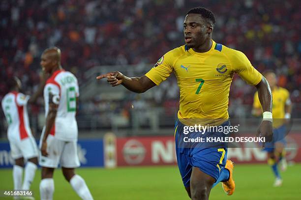 Gabon's Malick Evouna celebrates after scoring a goal during the 2015 African Cup of Nations group A football match between Burkina Faso and Gabon at...