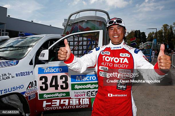 Jun Mitsuhashi of Japan for Team Land Cruiser Toyota Auto Body VDJ200 greets the fans prior to entering the podium during Day 14 of the Dakar Rally...