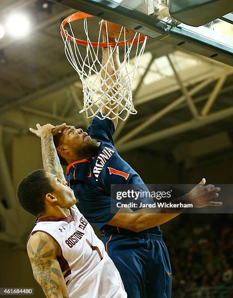 Dimitri Batten of the Boston College Eagles fouls Justin Anderson of the Virginia Cavaliers on his way to the basket in the second half during the...