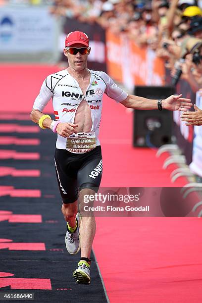 Cameron Brown of New Zealand finishes in third place at Ironman 70.0 on January 18, 2015 in Auckland, New Zealand.